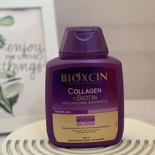 شامپو bioکسین بنفش مدل کلاژن و بیوتین ، ضد ریزش و حجم دهنده ، مناسب برای انواع موها بهویژه موهای کمپشت ، نازک و مستعد ریزش ، با حجم 300 میلی(واردات قانونی از منطقه آزاد ارس)
